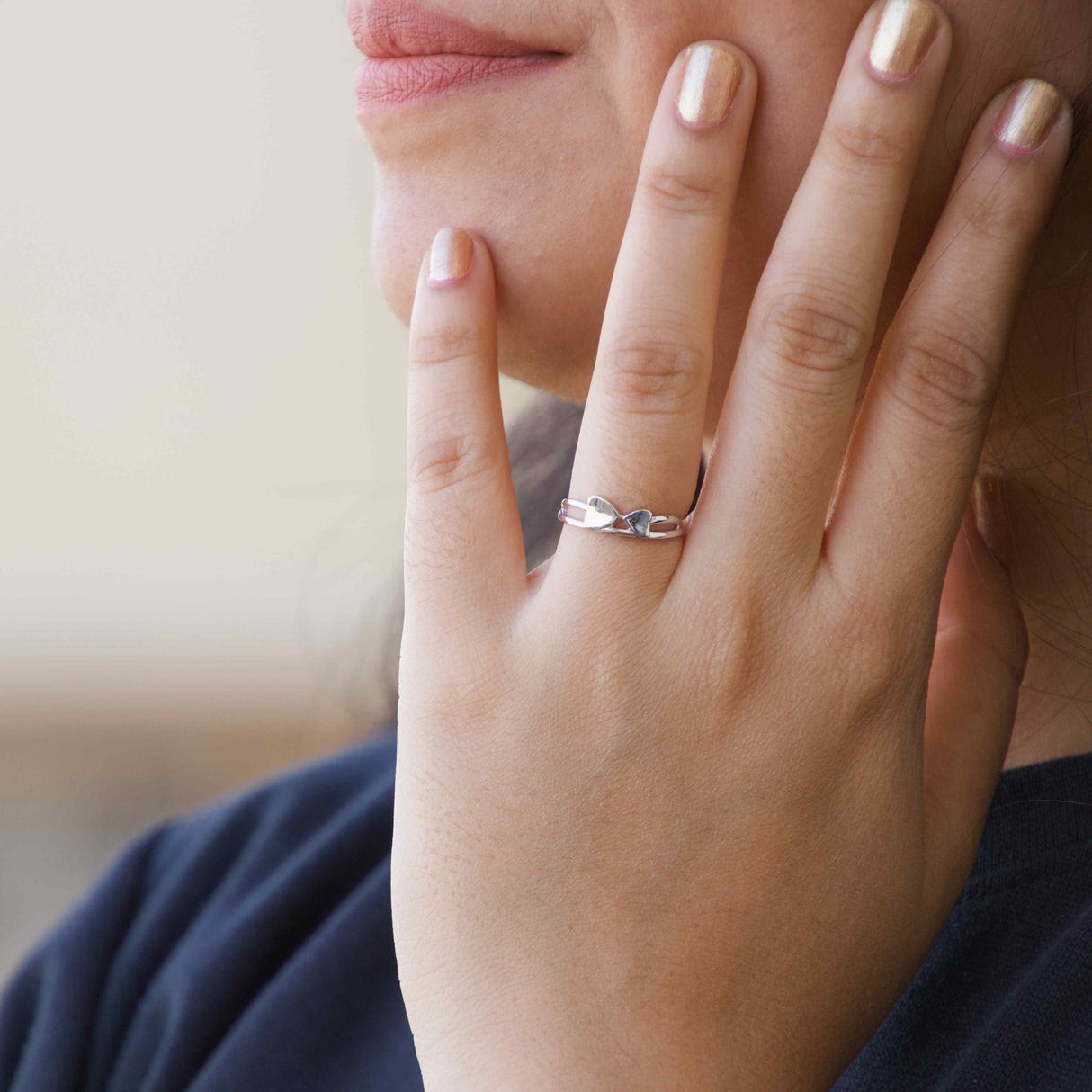 Joined Hearts Embrace Ring